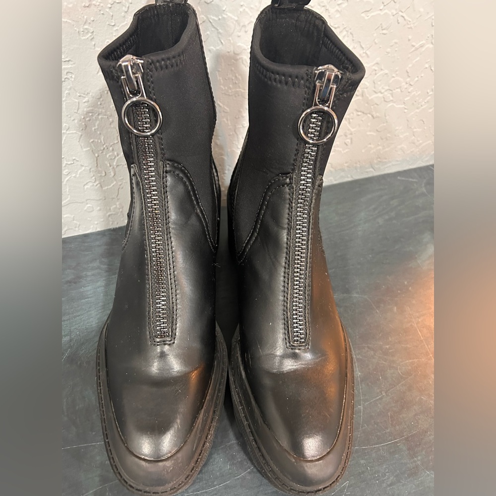 Zara black ankle combat booties with zip front.  EU 40